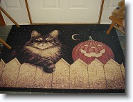 Halloween2008_007 * Our special Halloween front doormat.  The kitty pictured on it reminds us of Copernicus. * Our special Halloween front doormat.  The kitty pictured on it reminds us of Copernicus. * 1280 x 960 * (613KB)