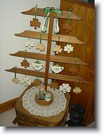 DSC02253B * The cookie tree in the kitchen decorated for St. Patrick's Day with an assortment of shamrock cookies and little glass Irish ornaments.  There's even a wee leprechaun at the base of the tree with his pot of gold. * The cookie tree in the kitchen decorated for St. Patrick's Day with an assortment of shamrock cookies and little glass Irish ornaments.  There's even a wee leprechaun at the base of the tree with his pot of gold. * 960 x 1280 * (229KB)