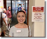 20220806_Phule_10 * Welcome to your Cyclone Home!  Residence Hall Director Carolina Monteiro, our gracious and generous guide for our Lange House tour. She does not realize the danger she is in turning her back on Billy, Wild Bill, Jedly and Animal. * 3714 x 3024 * (2.05MB)