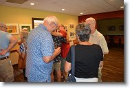 20250808_164910 * Dennis Stolk and his wife Ann talk with Dennis Gallagher.  In the background, John Klein and Dale Butler express their comradeship. * 4496 x 3000 * (7.48MB)